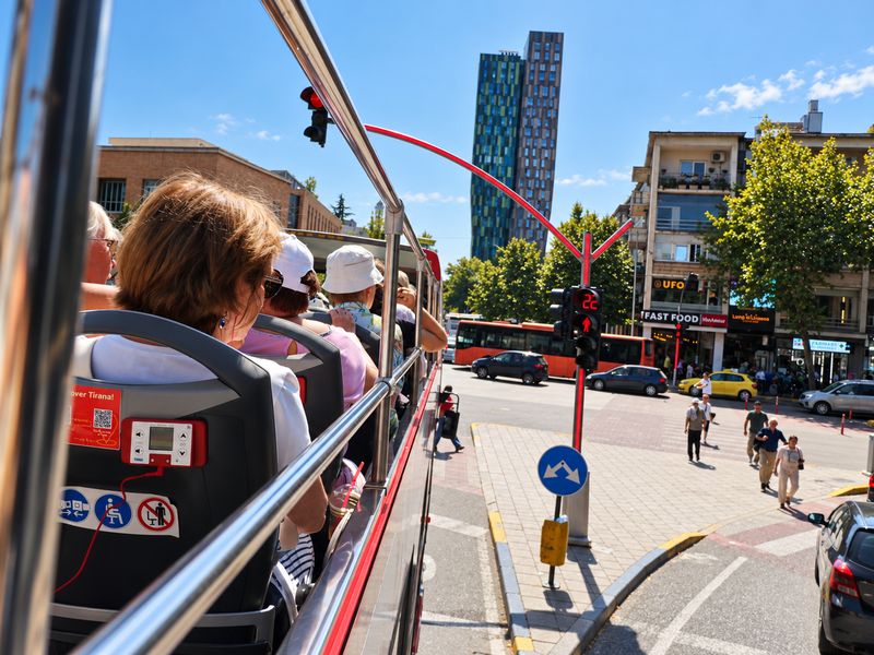 Sightseeing in Tirana from the top deck of the HOBUS bus
